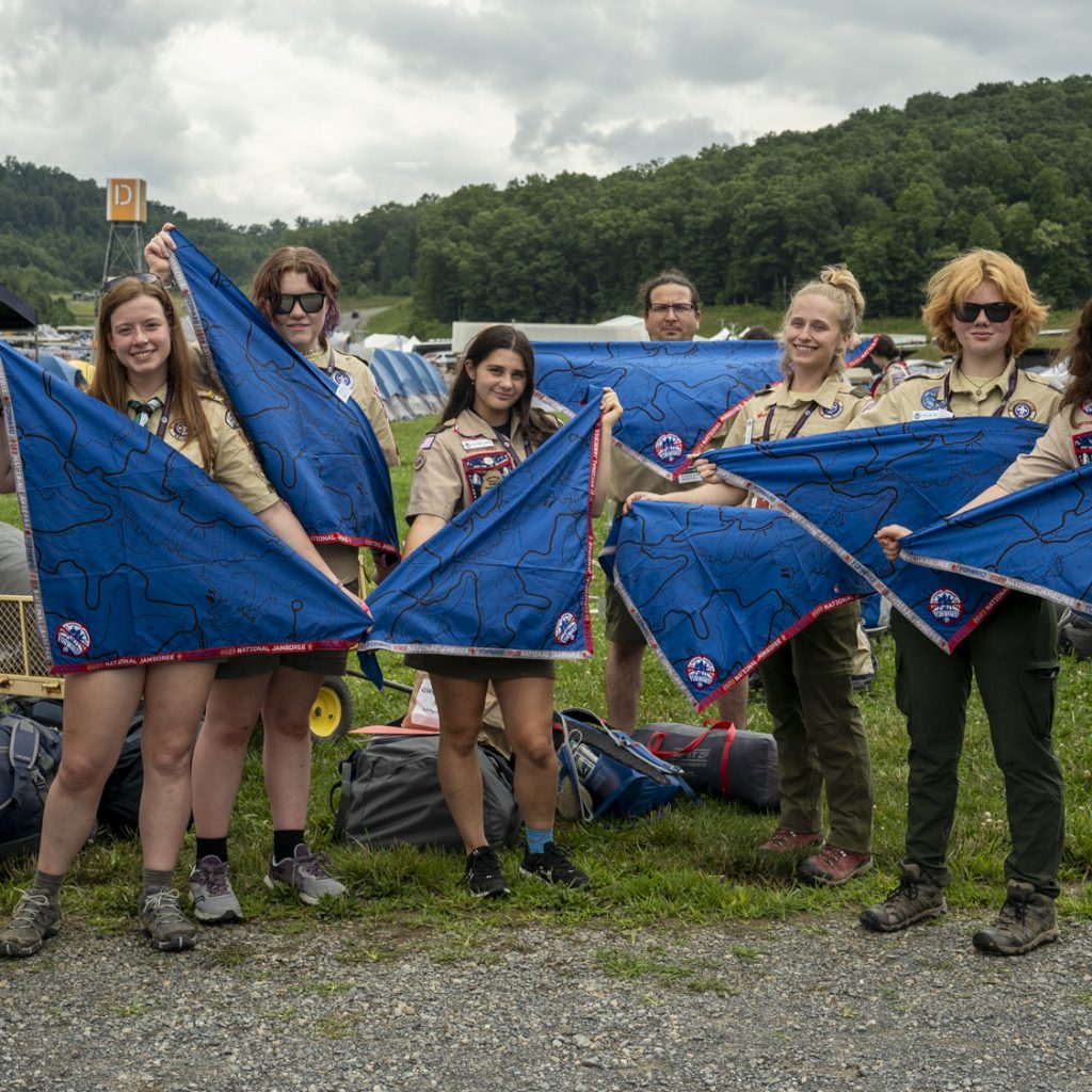 Scouts from the Cherokee Area Council showing off their neckerchiefs during the 2023 National Scout Jamboree at The Summit Bechtel Reserve in Mount Hope, West Virginia. (BSA Photo by Leo He)..**********Beginning of Shooting Data Section**********.20230719-15-13-11--LH     date - 7/19/23     time - 15:13:11