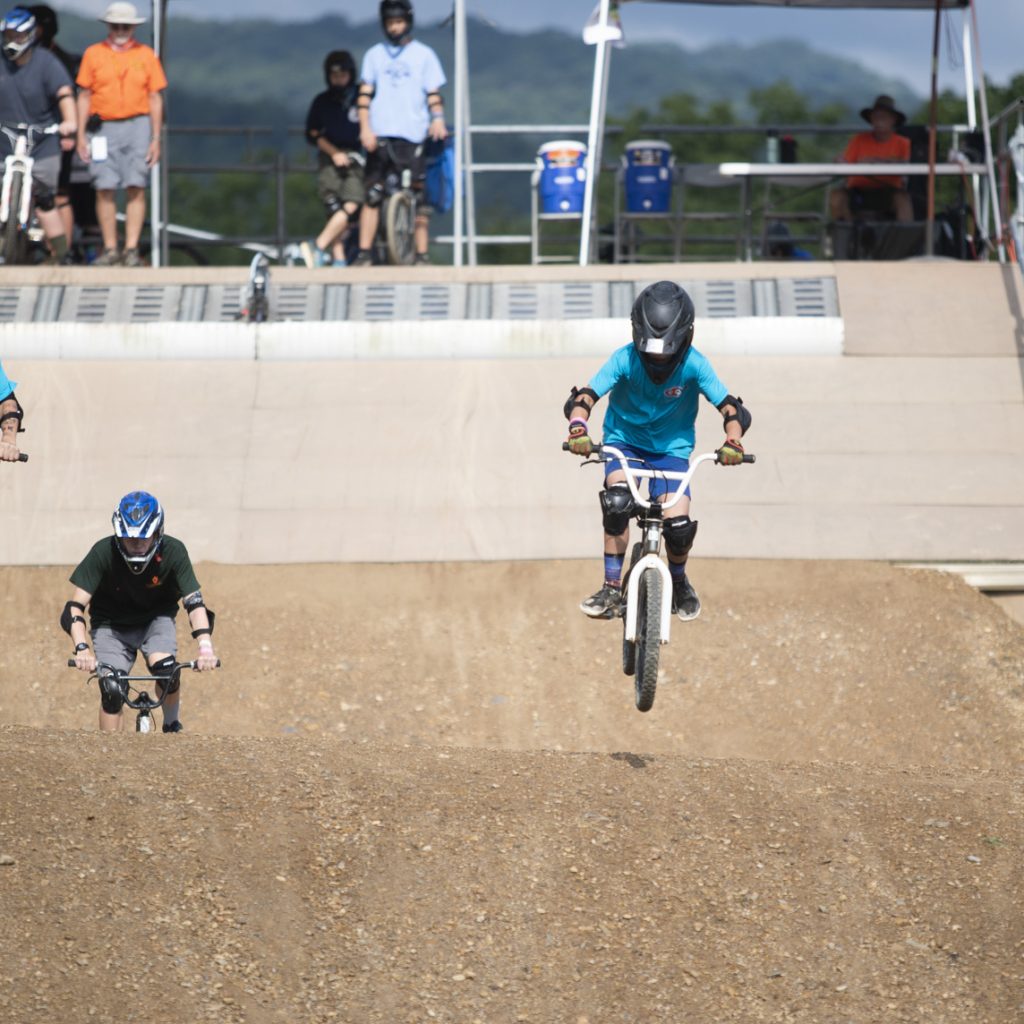 Scouts enjoy BMX at The Trax during the 2023 National Scout Jamboree at The Summit Bechtel Reserve in Mount Hope, West Virginia. (BSA Photo by Tom Copeland)..**********Beginning of Shooting Data Section**********.20230721-09-57-22-38-TC     date - 7/21/23     time - 9:57:22 AM.